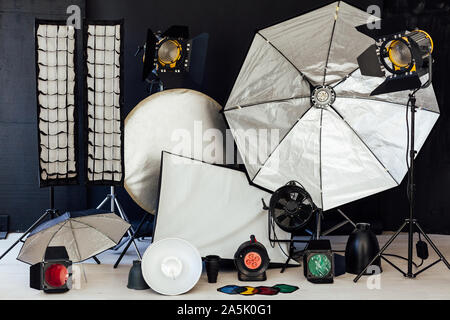 Photo studio equipment flash accessories photographer on a white ...