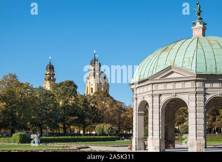 Diana Temple, Hofgarten, Munich, Germany, looking towards Theatine Church, a domed Catholic church and landmark feature of the Munich skyline. Stock Photo