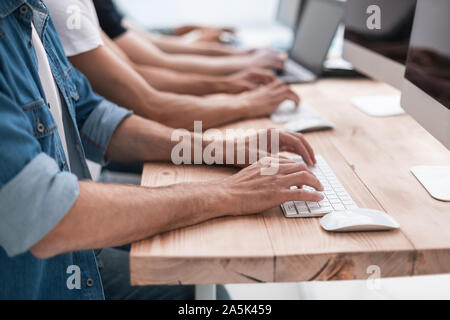 close up. colleagues work on their computers. business and education Stock Photo
