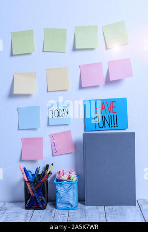 Conceptual hand writing showing Have Fun. Concept meaning wish somebody good and enjoyable time when they do something Sticky Notes Card on Wall Penci Stock Photo