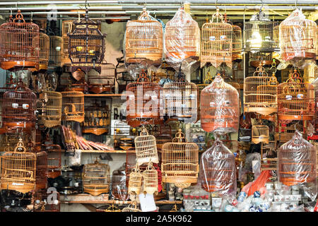 Shops specializing in decorative bamboo cages and supplies for songbirds at the Yuen Po Street Bird Garden in Mong Kok, Kowloon, Hong Kong. Stock Photo