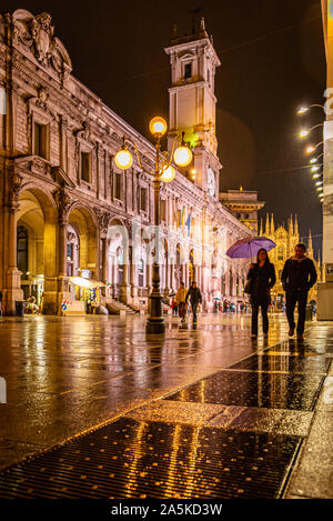 Walking in central Milan on a wet evening in October, Milan, Italy Stock Photo