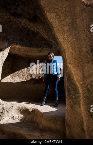 Woman exploring Selime Monastery, Göreme, Cappadocia, Nevsehir, Turkey Stock Photo