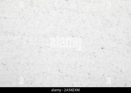 Grey non-woven fleecy synthetic polyester fabric sheet textured background Stock Photo