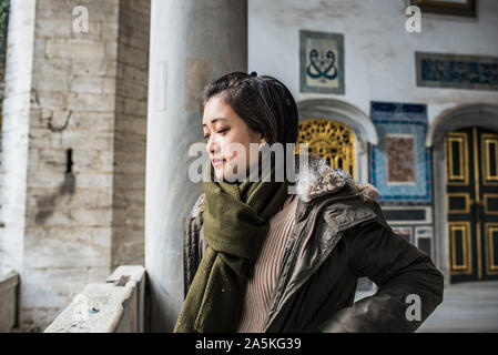 Woman exploring Topkapi Palace, Istanbul, Turkey Stock Photo