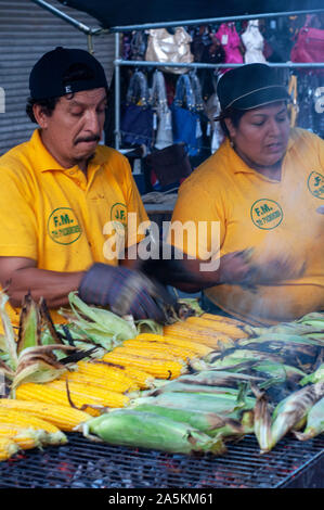 South American people selling corncobs in New York city, USA Stock Photo