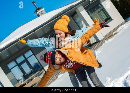 beautiful young couple posing in a snowy park, Stock Photo, Picture And  Rights Managed Image. Pic. ZON-9534094 | agefotostock