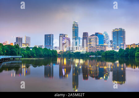 Austin, Texas, USA downtown skyline on the Colorado River at night. Stock Photo