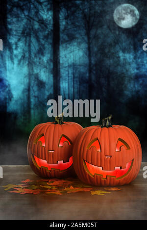 Halloween glowing pumpkins with fog Stock Photo