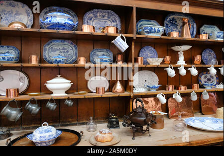 Wooden kitchen cabinet with ceramic plates and pots in kitchen in Serbia  Stock Photo - Alamy