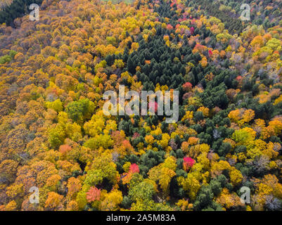 Dramatic fall foliage seen from the air near Quechee, Vermont.