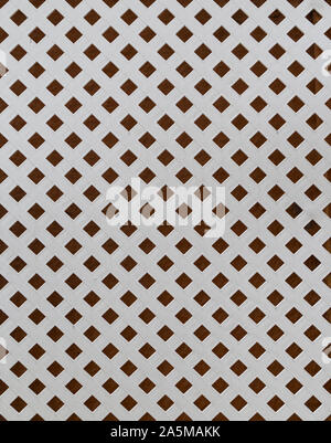 Wooden lattice outdoors painted in white. High resolution full frame background. Stock Photo