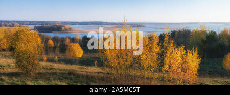 Panoramic view on  autumn landscape - yellow forest and blue lakes. Braslav, Belarus. Stock Photo