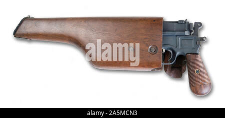 Antique German broomhandle pistol made around 1926 inside the wooden shoulder stock storage compartment. Stock Photo