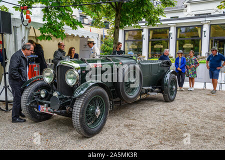 BADEN BADEN, GERMANY - JULY 2019: dark green BENTLEY 8 LITRE cabrio roadster 1930, oldtimer meeting in Kurpark. Stock Photo