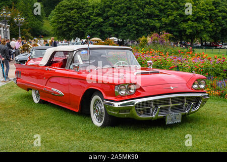 BADEN BADEN, GERMANY - JULY 2019: red white second generation FORD THUNDERBIRD AKA Square Bird cabrio 1958, oldtimer meeting in Kurpark. Stock Photo