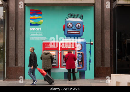 Clydesdale Bank cash dispensers in Glasgow City centre advertising the banks app-based banking B banking Stock Photo