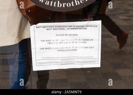 sign on door of Watt Brothers department store after going into administration saying no returns, refunds or gift cards Stock Photo