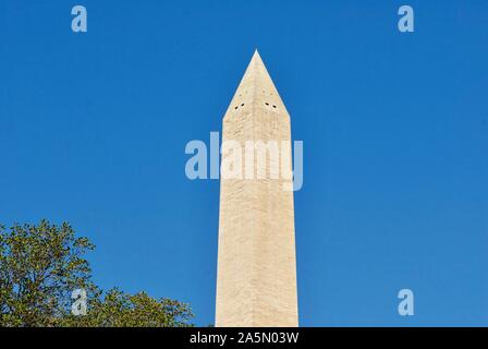 Washington, D.C., USA - October 15, 2019: The upper half of the Washington Monument stands out against a clear blue sky on a sunny Fall afternoon. Stock Photo