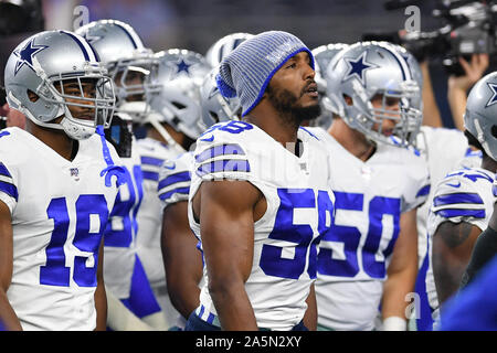 Oct 6, 2019: Dallas Cowboys defensive end Dorance Armstrong #92 reaches for Green  Bay Packers quarterback Aaron Rodgers #12 for a sack during an NFL game  between the Green Bay Packers and