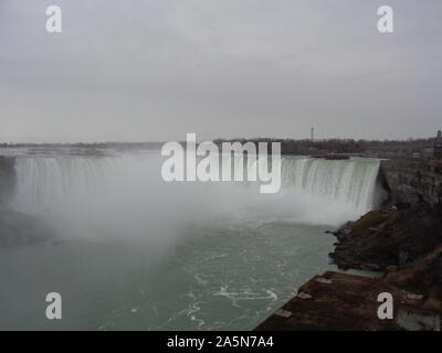 Winter in Niagara Falls: Niagara River Cascades over Horseshoe Falls Stock Photo