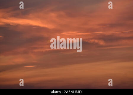 Red tone skies with swirling clouds. Stock Photo
