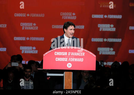 Montreal, Canada. 21st Oct, 2019. Canadian Prime Minister Justin Trudeau addresses party members at the Liberal Party campaign headquarters in Montreal, Canada, Oct. 21, 2019. Canadian Prime Minister Justin Trudeau's Liberal Party won the 2019 Canadian federal election Monday night, according to Elections Canada on Tuesday. Credit: Raffi Kirdi/Xinhua/Alamy Live News Stock Photo