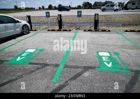 electric car charging at tesla ev charging point indiana USA Stock Photo