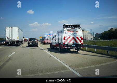 state farm indot emergency response hoosier helper vehicle on hard shoulder of interstate i-465 around indianapolis at rush hour indiana USA Stock Photo