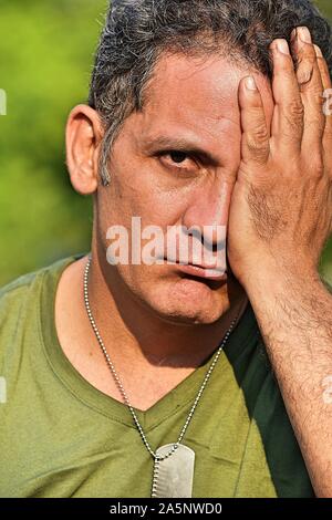 Male Soldier And Sadness Stock Photo