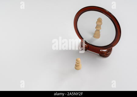 as a narcissus, the pawn is mirrored Stock Photo