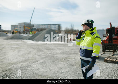Construction worker on building site Stock Photo