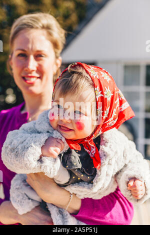 Mother with daughter dressed as Easter witch Stock Photo
