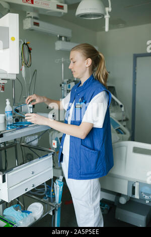 Female engineer checking hospital equipment Stock Photo