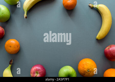 Fruits on grey background Stock Photo