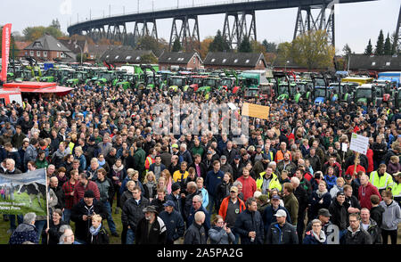 Rendsburg, Germany. 22nd Oct, 2019. Demonstrating farmers stand in front of their tractors at the demonstration. Nationwide, farmers are protesting against the federal government's agricultural policy with rallies. Credit: Carsten Rehder/dpa/Alamy Live News Stock Photo