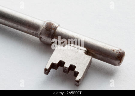 metal key on a white background
