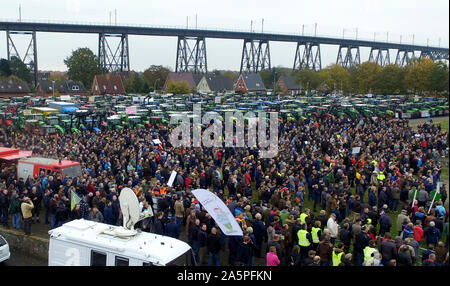 Rendsburg, Germany. 22nd Oct, 2019. Demonstrating farmers stand in front of their tractors at the demonstration. Nationwide, farmers are protesting against the federal government's agricultural policy with rallies. (recording with drone) Credit: Carsten Rehder/dpa/Alamy Live News Stock Photo