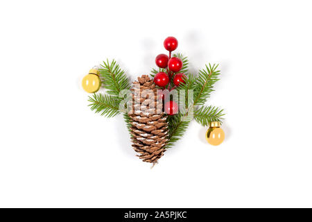 Cone pine, golden bells decorations, red and orange christmas tree ball on  white Stock Photo - Alamy