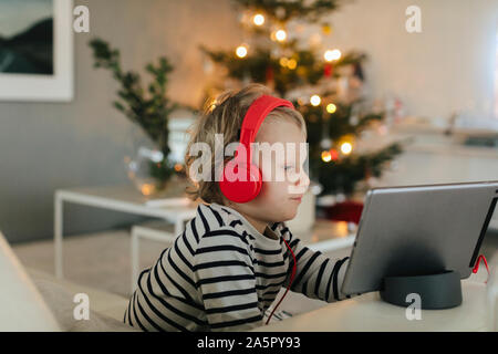 Boy using digital tablet Stock Photo