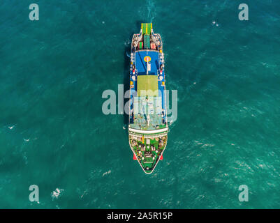 aerial ferry in the sea on a sunny day blue water Stock Photo
