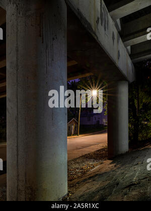 Underneath Bridge City Street With Street Light Stock Photo