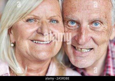 Happy seniors couple as a smiling couple Stock Photo