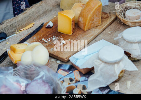 lots of different fresh cheese background food Stock Photo