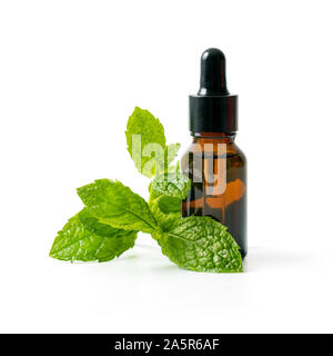 bottle with mint essential oil and green leaf isolated on white background Stock Photo