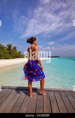 Young woman at the Paradise Island (Lankanfinolhu), Maldives Stock Photo