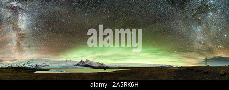 Milky Way and Aurora Borealis, Fjallsarlon, Vatnajokull National Park, Iceland Stock Photo