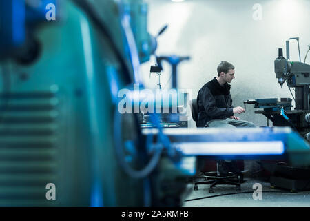 engineer in a workshop working Stock Photo