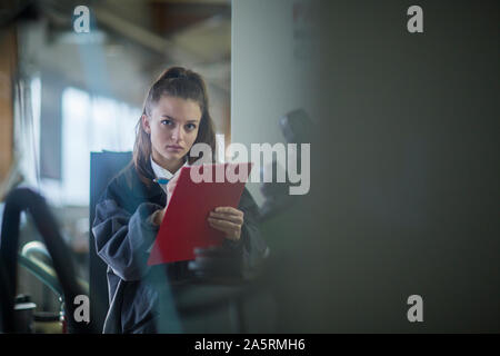 industrial plant with an engineer female Stock Photo