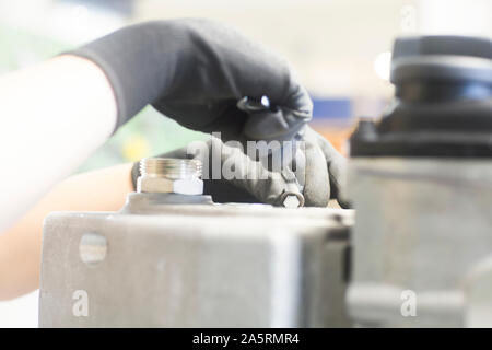 hand of a block heat and power plant engineer female Stock Photo